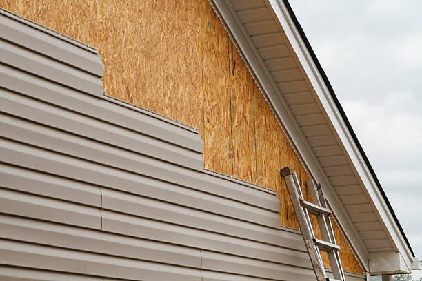 Professional Fiber Cement Siding technician working in Tomball, TX